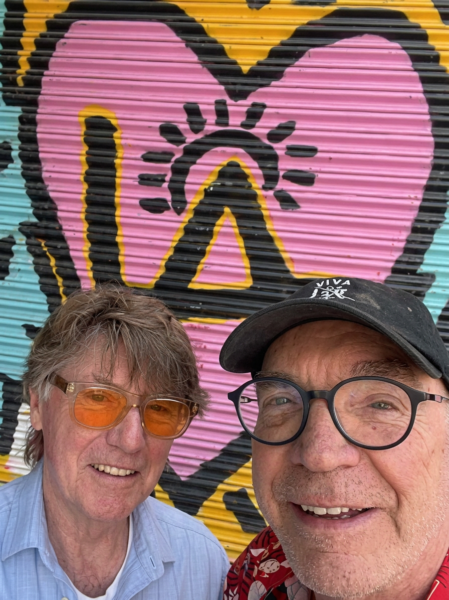 Andre Miripolsky and Ray Williams together in front of a mural